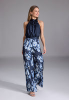 Jumpsuit mit Schluppenblusen Top und Druck Hose
