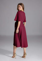 Chiffon Kleid in Wickel Optik mit Vokuhila Saum