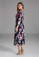 Midi Kleid aus bedrucktem Mesh mit Drapierung im Oberteil