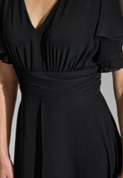 Chiffon Jumpsuit mit Überrock und Volantärmeln