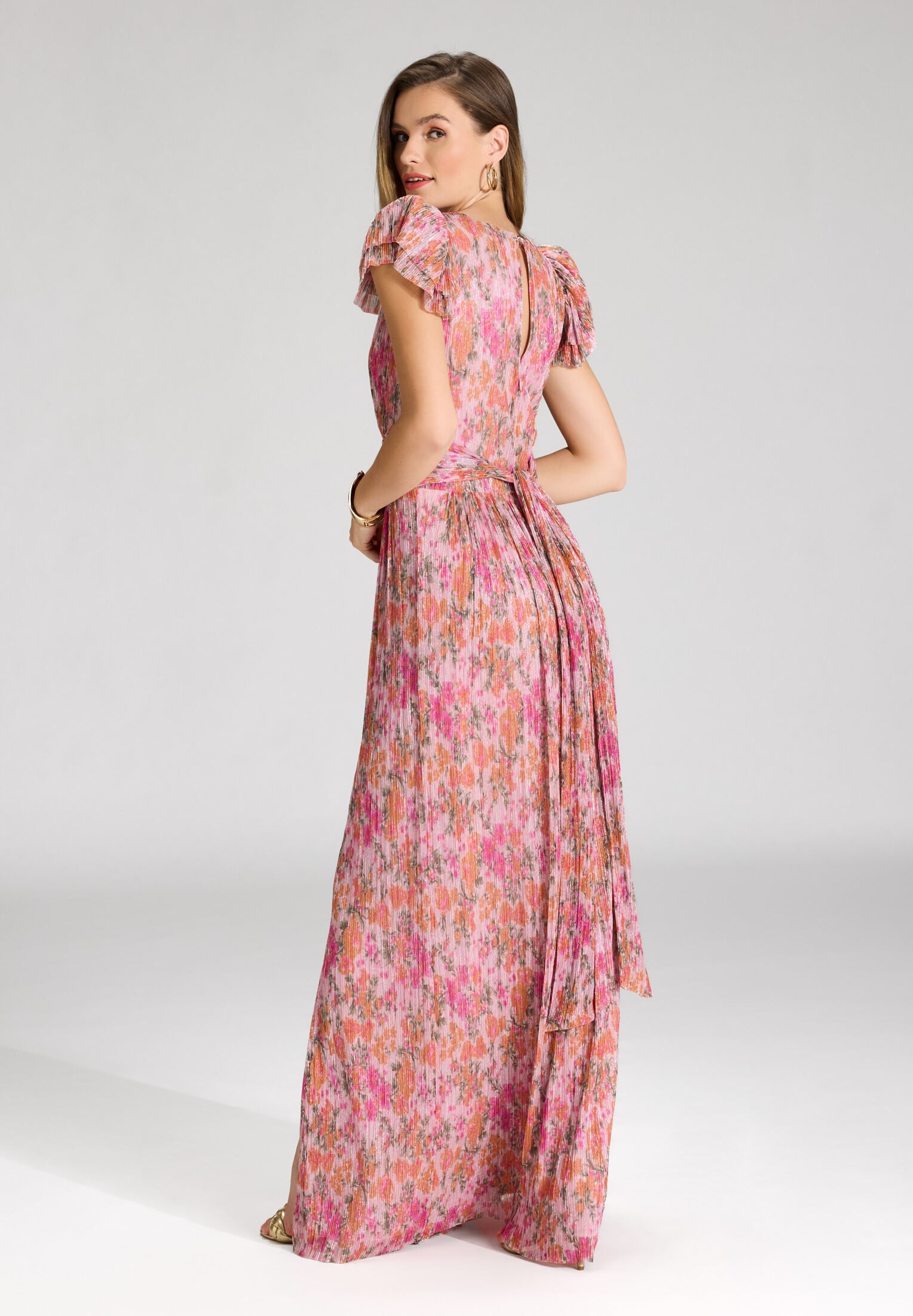 Abendkleid aus bedrucktem Plissee Jersey mit betonter Schulter