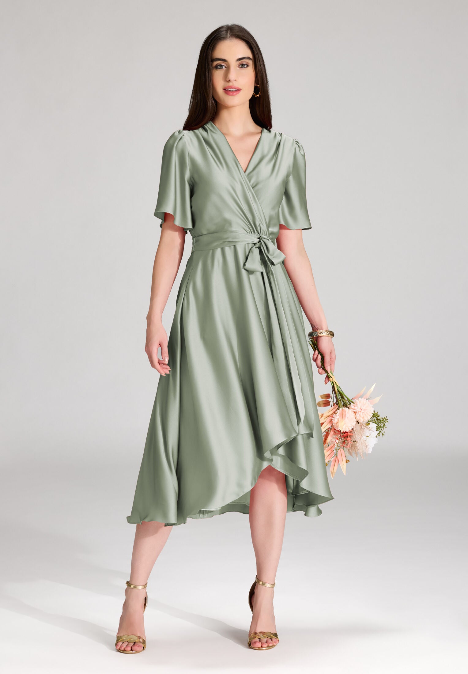 Cocktailkleid aus nachhaltigem Satin in Wickel Optik pistachio green