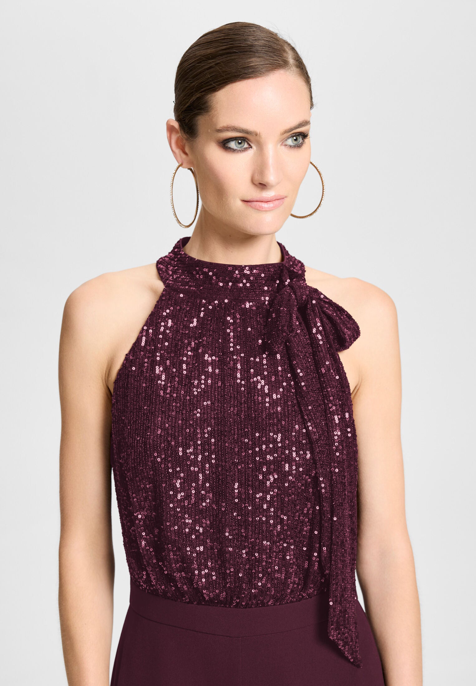 Ärmelloser Jumpsuit mit Schluppenblusen Top aus elastischer Paillette