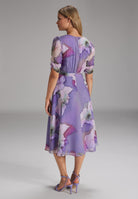 Blumiges Chiffonkleid mit Raffärmeln