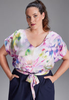 Jumpsuit aus Material Mix