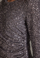 Cocktailkleid aus elastischer Paillette mit seitlichen Drapierungen