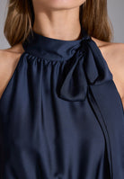 Jumpsuit mit Schluppenblusen Top und Druck Hose