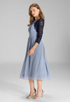 Bolero aus Spitze mit Bogenkante