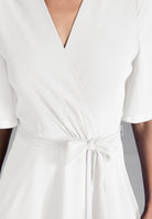 Chiffon Kleid in Wickel Optik mit Vokuhila Saum