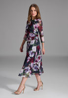 Midi Kleid aus bedrucktem Mesh mit Drapierung im Oberteil