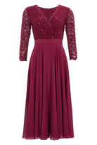 Cocktailkleid aus Material-Mix