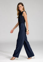 Jumpsuit aus Material-Mix mit Drapierung