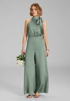 Jumpsuit mit Schluppe aus gehämmertem Satin pistachio green