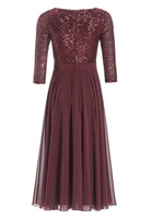 Cocktailkleid in Midi Länge mit Top aus elastischer Paillette und Tellerrock in Chiffon